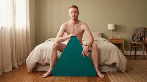 A bedroom in morning light. Digitally generated image. The figure is an illustration, not a photograph of a real person, a patient or a customer.